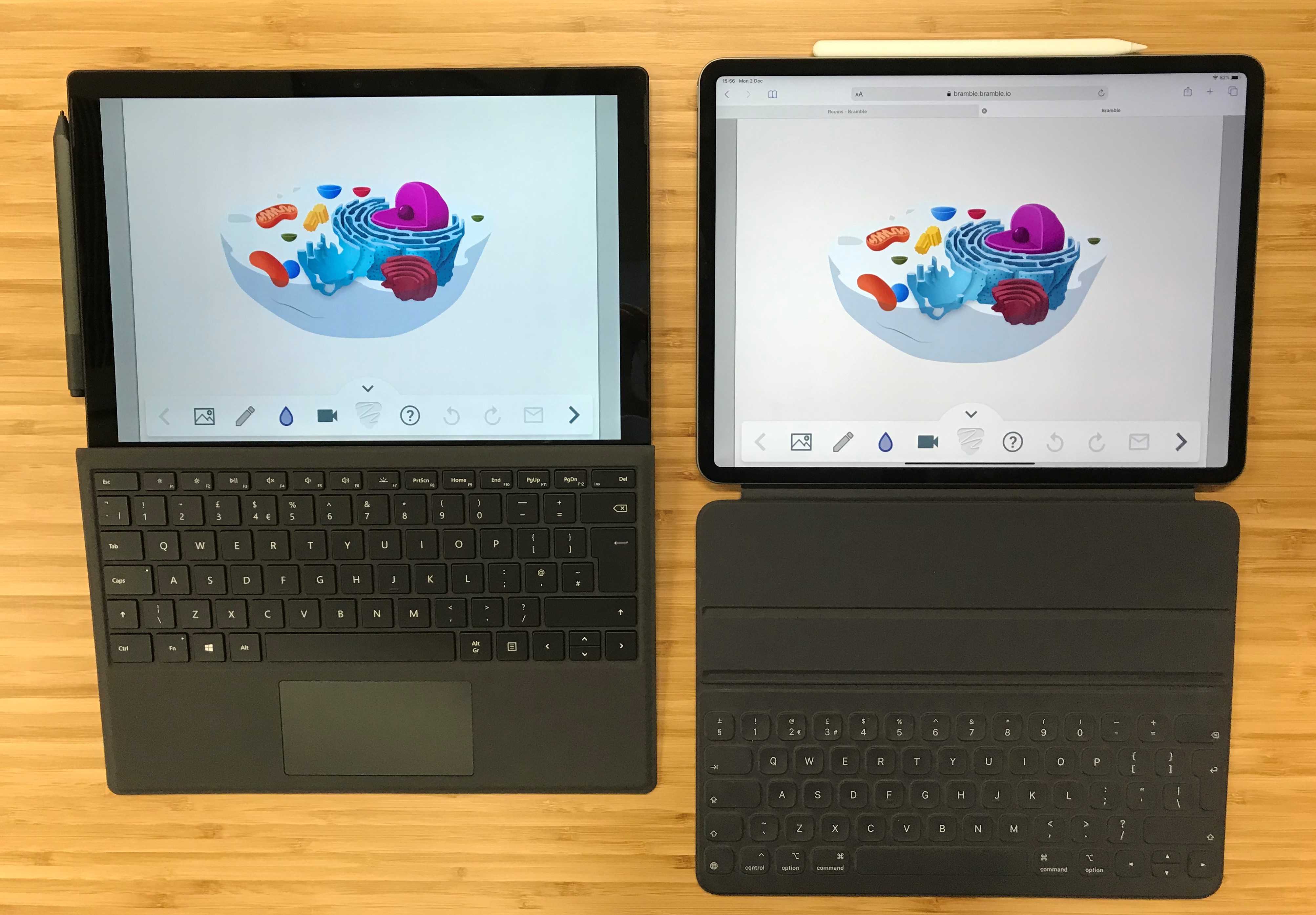 picture of a Windows Surface Pro 7 with a Surface Pen next to an iPad Pro and Smart Keyboard